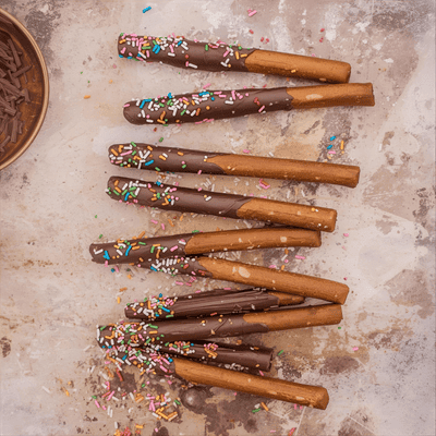 Chocolate-dipped pretzel rods for kids’ parties 2025