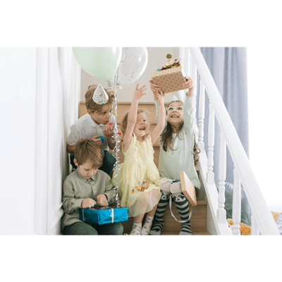 Pass the Parcel game with Melissa & Doug blocks for sharing skills